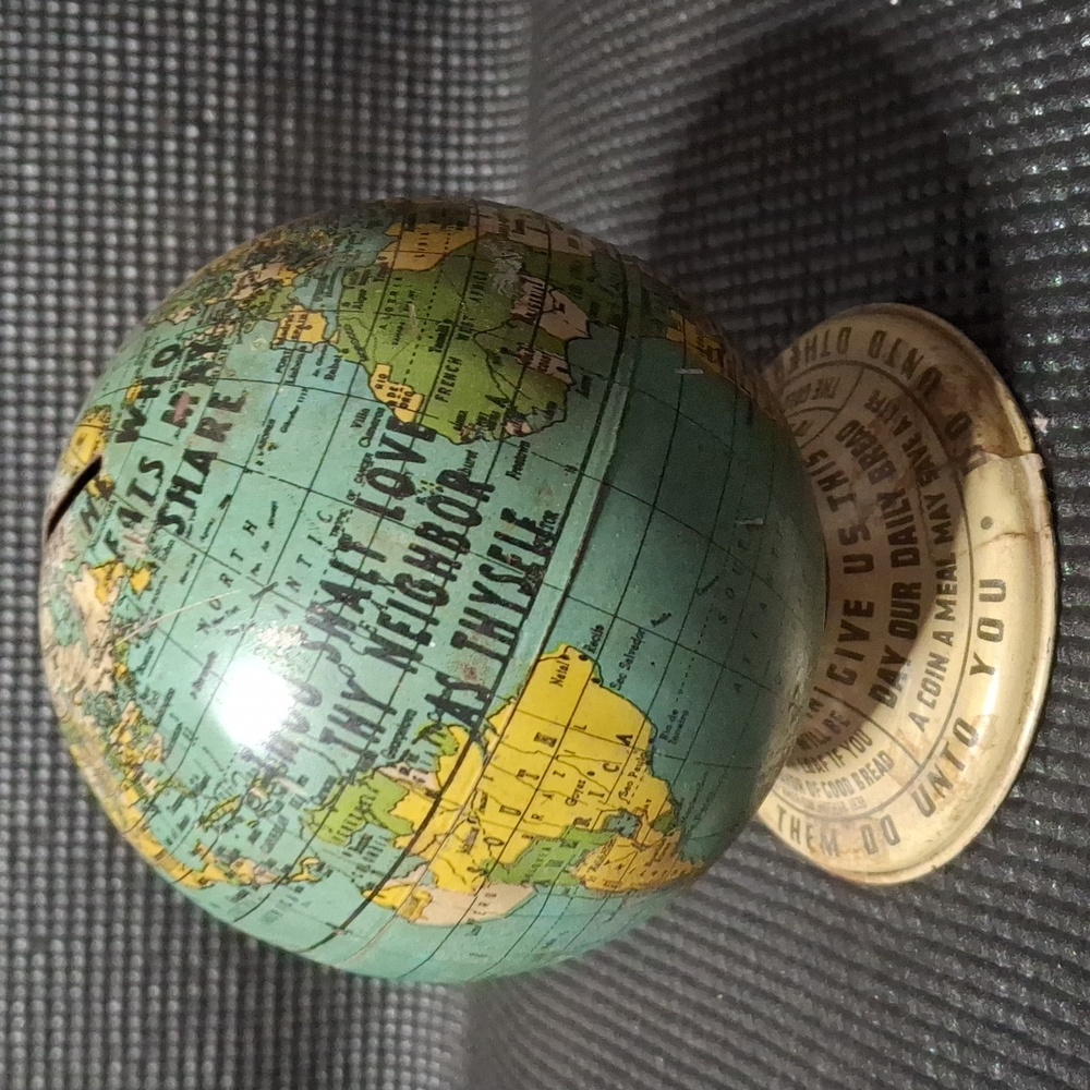Three and a half four and a half inch tall vintage piggy bank